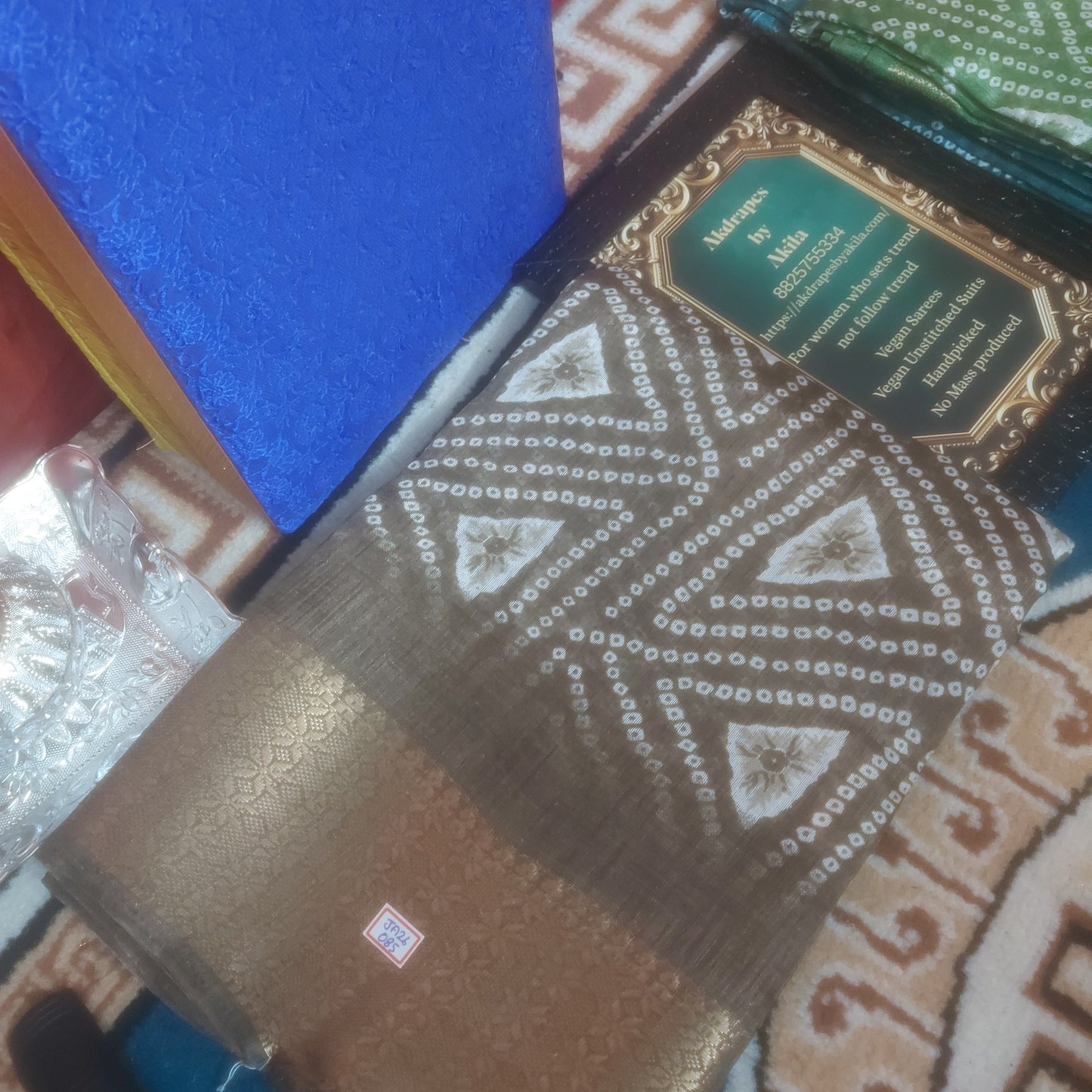 Brown vegan bandhini linen weaving border saree JA26086