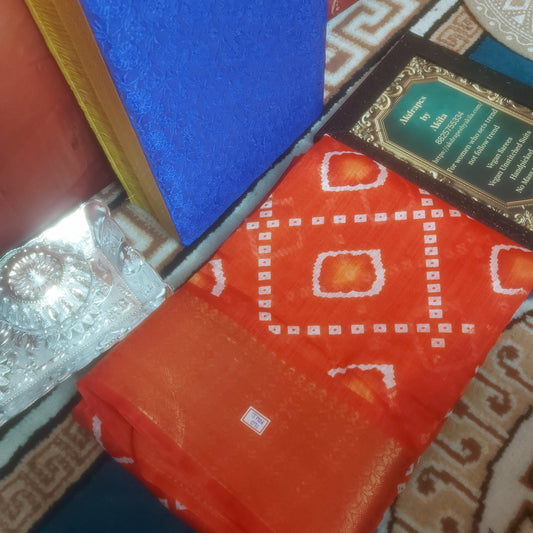 Orange vegan bandhini linen weaving border saree JA26071