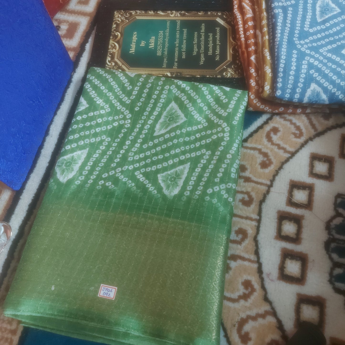 Green Bandhini vegan dola weaving border saree JA26092