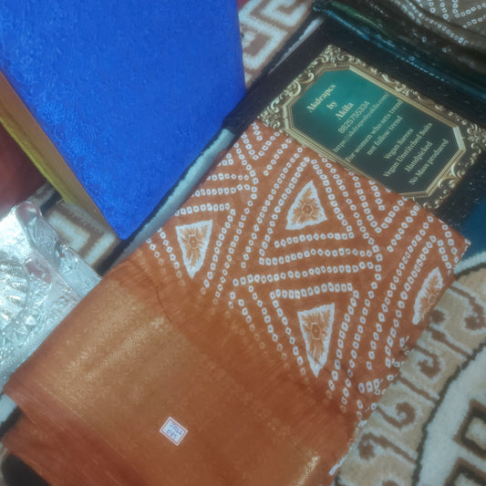 Rust orange vegan bandhini linen weaving border saree JA26087